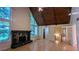 Spacious living room boasts a fireplace, hardwood floors, and large windows, offering scenic views and lots of sunlight at 3246 Able Ct, Marietta, GA 30062