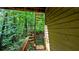 Exterior spiral staircase offers a unique architectural detail enhancing access to the multi-level deck areas at 3246 Able Ct, Marietta, GA 30062
