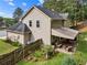 View of backyard, patio with furniture, and landscaped yard with privacy fence at 4108 Berryhill Se Trce, Smyrna, GA 30082