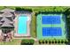 Aerial of community pool, tennis courts and clubhouse, offering recreation and social opportunity at 1054 Morgan Garner Sw Dr, Lilburn, GA 30047