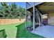 Patio looking out on to a large backyard with wooden fence at 1054 Morgan Garner Sw Dr, Lilburn, GA 30047