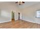 Hardwood floor bedroom with vaulted ceilings, large doorways, and neutral walls at 1054 Morgan Garner Sw Dr, Lilburn, GA 30047