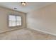 This bedroom is a blank canvas ready for personalization with neutral colors and plush carpet at 1054 Morgan Garner Sw Dr, Lilburn, GA 30047