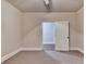 Bedroom with neutral paint, carpet, crown molding, and a view to the hall at 1054 Morgan Garner Sw Dr, Lilburn, GA 30047