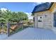 Wooden deck with gray railings overlooking a fenced backyard, providing an ideal outdoor space at 1054 Morgan Garner Sw Dr, Lilburn, GA 30047