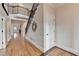 Elegant foyer with hardwood floors, a staircase, and an open view to the living areas at 1054 Morgan Garner Sw Dr, Lilburn, GA 30047