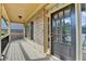 Welcoming porch entrance, showcasing brickwork, a stylish door, and a comfortable outdoor space at 1054 Morgan Garner Sw Dr, Lilburn, GA 30047
