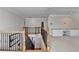 Second floor hallway with detailed wrought iron railing, and built-in desk at 1054 Morgan Garner Sw Dr, Lilburn, GA 30047