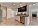 Kitchen area features stainless steel dishwasher, sink and hardwood floors at 1054 Morgan Garner Sw Dr, Lilburn, GA 30047