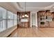 Bright kitchen features custom cabinets, hardwood floors, and stainless steel appliances at 1054 Morgan Garner Sw Dr, Lilburn, GA 30047