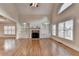 Bright living room boasting hardwood floors, fireplace, built-in cabinets, and lots of natural light at 1054 Morgan Garner Sw Dr, Lilburn, GA 30047