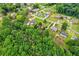 Residential neighborhood surrounded by dense trees, offering a peaceful and private community at 150 Wilbanks St, Buford, GA 30518
