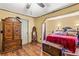 Primary bedroom boasts a decorative wood chest, bright lighting, and neutral colors adding a sense of serenity at 150 Wilbanks St, Buford, GA 30518
