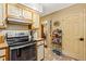 Well-equipped kitchen featuring modern appliances and access to other rooms with a good layout for easy living at 150 Wilbanks St, Buford, GA 30518
