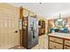 Spacious kitchen featuring stainless steel appliances, abundant storage, and easy access to adjacent living areas at 150 Wilbanks St, Buford, GA 30518