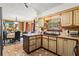 Open concept kitchen with breakfast nook and updated appliances, seamlessly blending cooking and dining spaces at 150 Wilbanks St, Buford, GA 30518