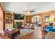 Inviting living room with a fireplace, built-in bookshelves, and a seamless flow into the dining area at 150 Wilbanks St, Buford, GA 30518