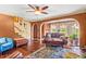 Cozy living room with hardwood floors and an archway leading to the dining room at 150 Wilbanks St, Buford, GA 30518