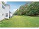 Large backyard featuring a large grassy area at 1592 Smithson Ct, Lithonia, GA 30058