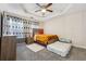 Bedroom with a tray ceiling offers natural light, plush carpeting and two beds at 1592 Smithson Ct, Lithonia, GA 30058