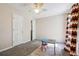 A bedroom with colorful curtains and a table and chair set at 1592 Smithson Ct, Lithonia, GA 30058