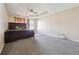 Bedroom features tray ceilings, ceiling fan and lots of space at 1592 Smithson Ct, Lithonia, GA 30058