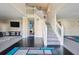 Spacious foyer with hardwood floors, staircase, and an open view to the living area at 1592 Smithson Ct, Lithonia, GA 30058