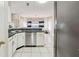 Functional kitchen with stainless steel appliances, sleek counter tops, and an open layout to the dining area at 1592 Smithson Ct, Lithonia, GA 30058