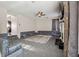 Cozy living room with custom sofa, ceiling fan and carpet at 1592 Smithson Ct, Lithonia, GA 30058