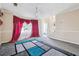 Inviting living space boasting bright lighting, with a view of the staircase and entrance at 1592 Smithson Ct, Lithonia, GA 30058