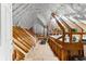 Large unfinished attic with wooden beams and spray foam insulation, primed for customization at 248 Montrose Dr, Mcdonough, GA 30253