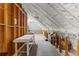 Expansive attic featuring a carpeted floor and wooden frame for potential customization at 248 Montrose Dr, Mcdonough, GA 30253