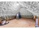 Bright attic space with spray foam insulation and wooden beams; ideal for storage at 248 Montrose Dr, Mcdonough, GA 30253