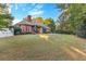 Well-maintained lawn and mature trees in the backyard at 248 Montrose Dr, Mcdonough, GA 30253