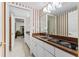 Bar area with white cabinets, granite countertops, and a sink with an electric cooktop at 248 Montrose Dr, Mcdonough, GA 30253