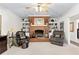 Cozy basement with fireplace and built-in shelving, offering a comfortable and inviting space at 248 Montrose Dr, Mcdonough, GA 30253
