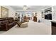 Spacious basement with a living room, a pool table, and built-in shelves for storage and entertainment at 248 Montrose Dr, Mcdonough, GA 30253