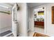 The Primary bedroom is accessible from the entryway, featuring natural light, traditional furnishings, and neutral decor at 248 Montrose Dr, Mcdonough, GA 30253