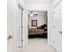 Bedroom with a patterned bedspread and decorative pillows, viewed through a doorway at 248 Montrose Dr, Mcdonough, GA 30253
