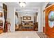 Elegant entryway featuring a view to a cozy living room and stylish accents at 248 Montrose Dr, Mcdonough, GA 30253