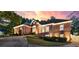 Stunning brick home featuring a grand entrance, manicured landscaping, and a private gated driveway at 248 Montrose Dr, Mcdonough, GA 30253
