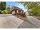Charming brick home featuring well-manicured landscaping and a spacious driveway for easy access at 248 Montrose Dr, Mcdonough, GA 30253