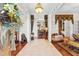 Grand foyer featuring elegant decor, tile flooring, and views into adjacent living spaces at 248 Montrose Dr, Mcdonough, GA 30253