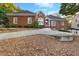 Classic brick home featuring a manicured lawn, elegant entrance, and a concrete driveway at 248 Montrose Dr, Mcdonough, GA 30253