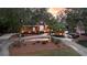Elegant brick home with manicured front lawn and lush landscaping at 248 Montrose Dr, Mcdonough, GA 30253