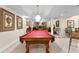 Finished basement with a pool table and seating area for entertaining guests at 248 Montrose Dr, Mcdonough, GA 30253