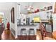 Well-appointed kitchen with black countertops, white cabinets and stainless steel appliances at 248 Montrose Dr, Mcdonough, GA 30253