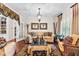 Inviting living room featuring comfortable seating, refined decor, and ample natural light at 248 Montrose Dr, Mcdonough, GA 30253