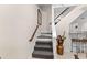 Stairway with gray carpet leading to the basement bar area at 248 Montrose Dr, Mcdonough, GA 30253
