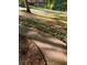 Landscaped front yard with a stone-edged sidewalk and lush greenery at 5582 Brady Dr, Stone Mountain, GA 30087